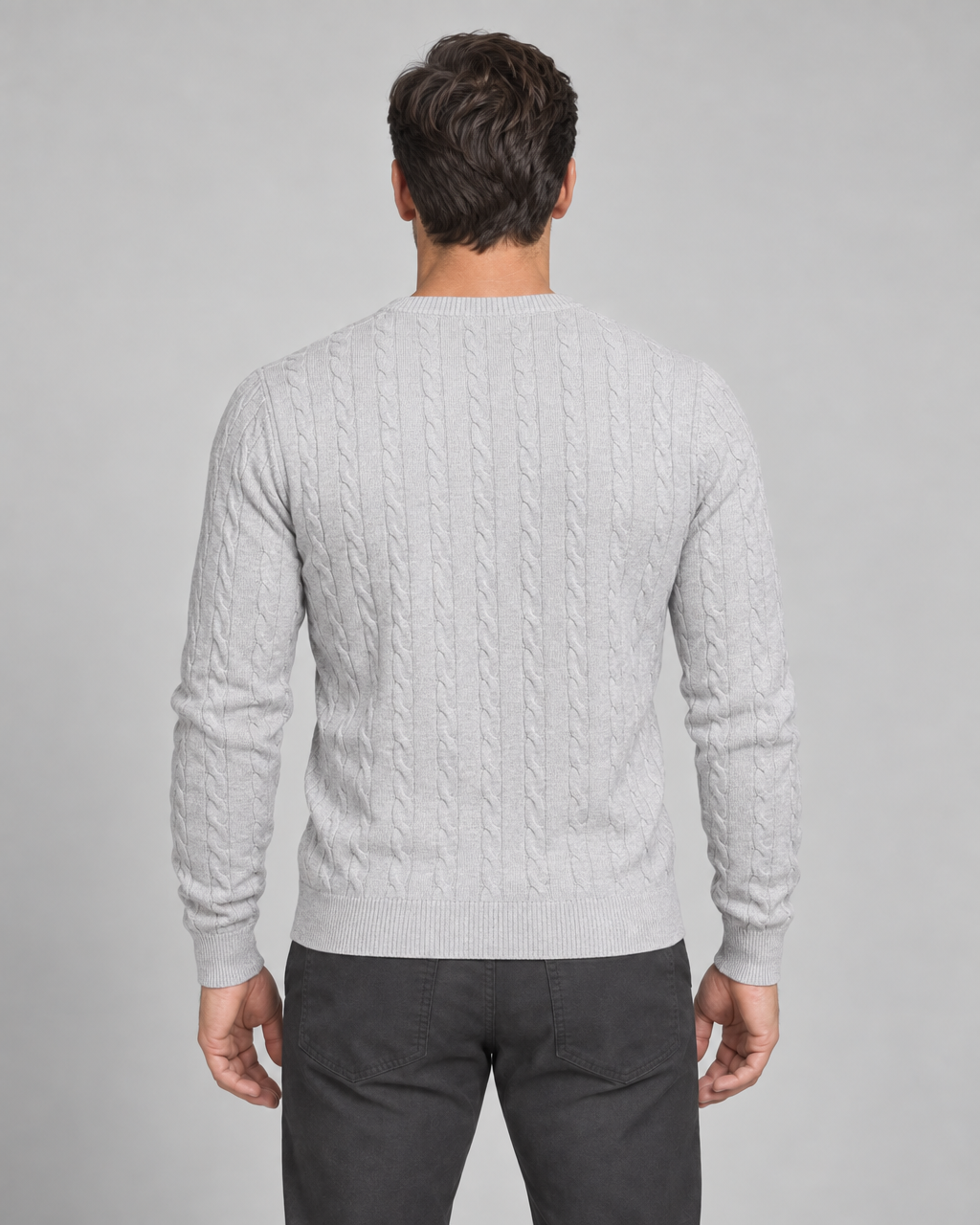 Back-view concept of a light grey cable-knit crew-neck jumper with long sleeves and ribbed trims.