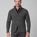 Front cropped view of a grey textured jacket with a stand collar, three buttons and two angled pockets.
