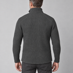Cropped back view of a man wearing a dark grey textured jacket with a high collar and long sleeves