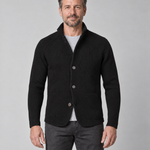 Front cropped view of a man wearing a black textured jacket with a raised collar, three buttons and patch pockets