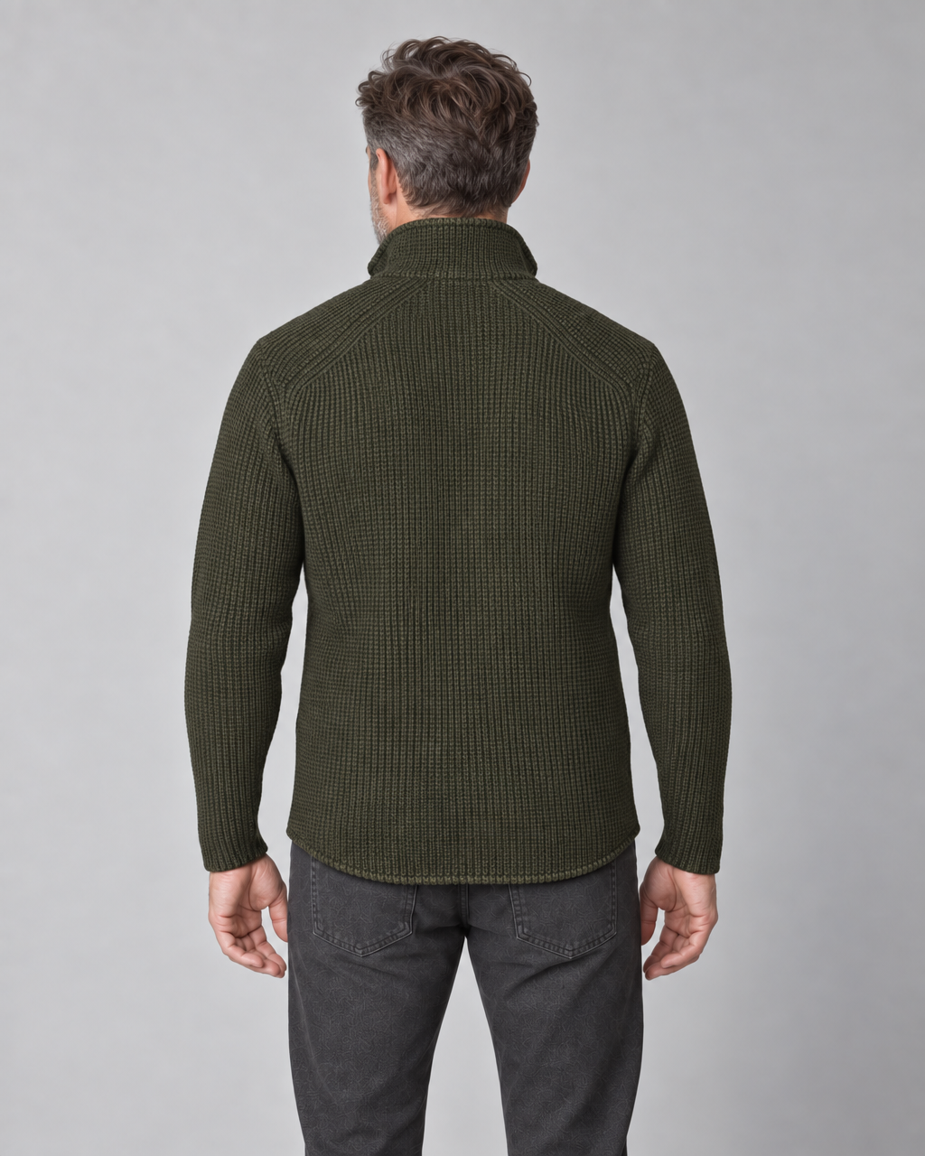 Dark green ribbed jacket with a high collar, shown from the back on a model.