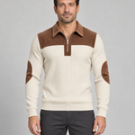 Front view of a beige ribbed quarter-zip jumper with brown yoke, collar and elbow patches.