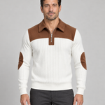 Front cropped view of a white ribbed jumper with a brown shoulder yoke, zip collar and elbow patches.