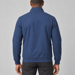 Back view of a man wearing a blue jacket with a raised collar, long sleeves, ribbed cuffs and hem.
