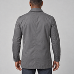 Back view of a model wearing a grey mid-length coat with a pointed collar and buttoned cuffs.