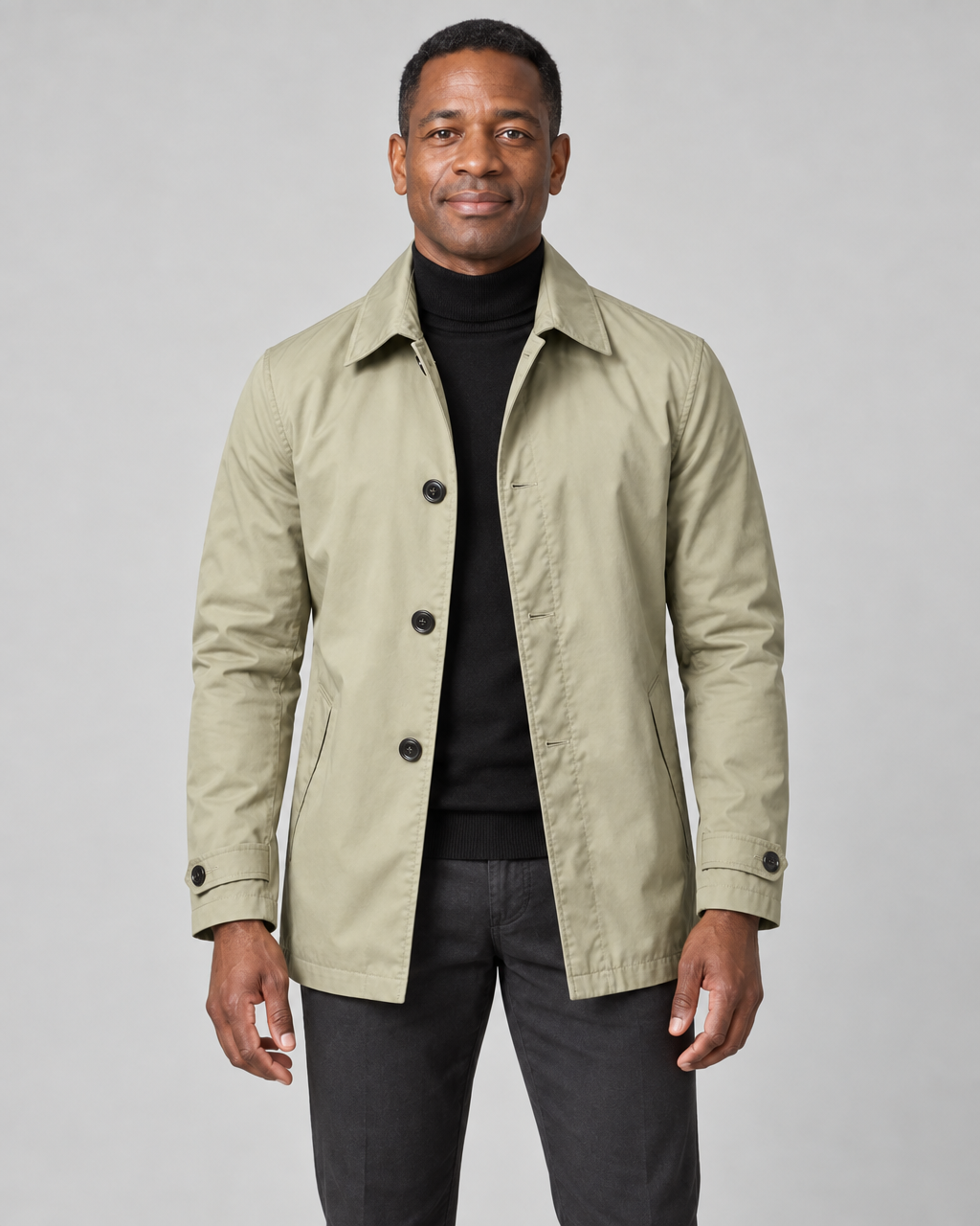 Men's khaki button-front coat with a pointed collar, side pockets and cuff tabs, shown from the front.