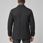 Model shown from behind wearing a black mid-length coat with a pointed collar and button-tab cuffs.