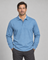 Front cropped view of a man wearing a light blue long-sleeved polo shirt with a buttoned collar