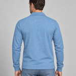 Back view of a light blue long-sleeve polo shirt with ribbed cuffs and a plain back