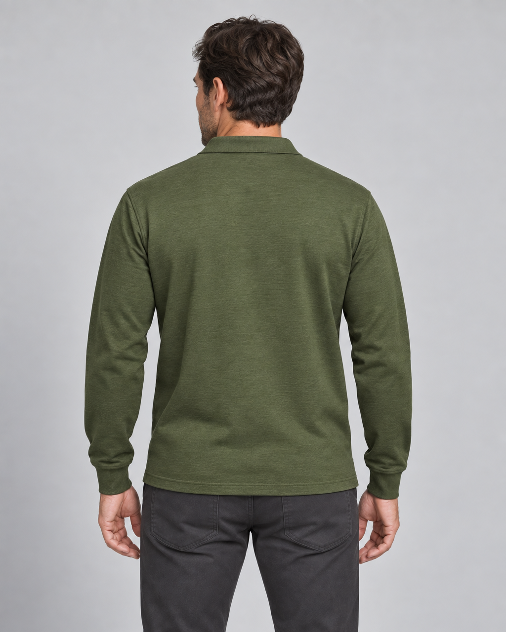 Back crop of a model wearing a military green long-sleeve collared shirt